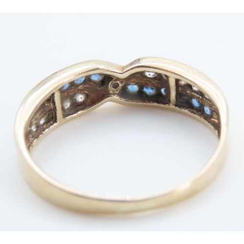 1243 - Sapphire and Gemstone Crossover Ring Mounted in 9 Carat Yellow Gold Band Ring Size M and a Half