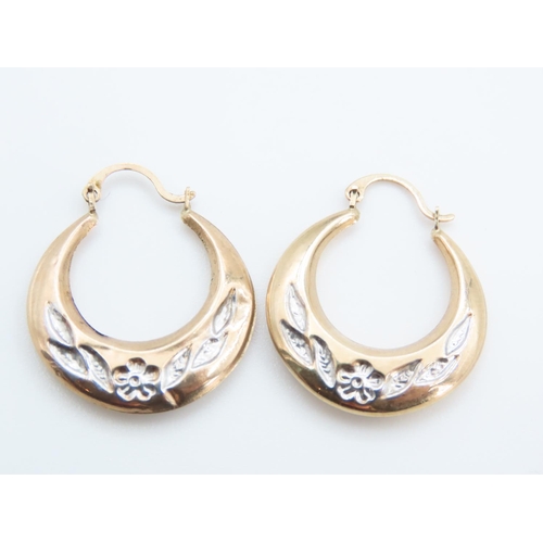 1250 - Pair of 9 Carat Yellow and White Floral Cut Hoop Earrings