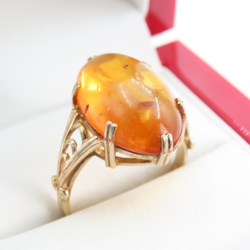 1256 - Basket Set Amber Statement Ring Mounted on 9 Carat Yellow Gold Ring Size R and a Half