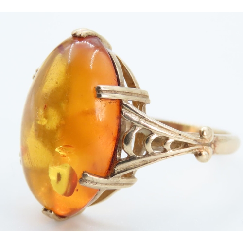 1256 - Basket Set Amber Statement Ring Mounted on 9 Carat Yellow Gold Ring Size R and a Half