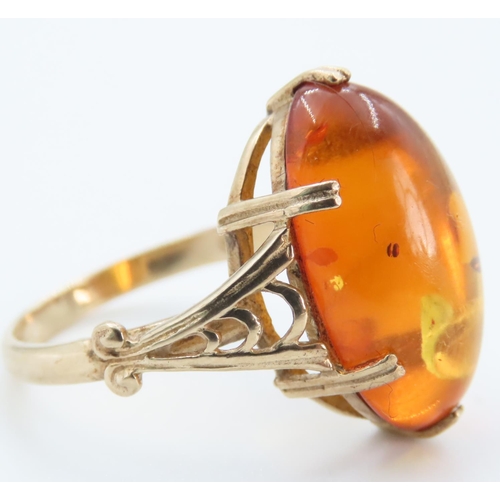 1256 - Basket Set Amber Statement Ring Mounted on 9 Carat Yellow Gold Ring Size R and a Half