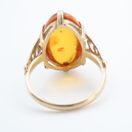 1256 - Basket Set Amber Statement Ring Mounted on 9 Carat Yellow Gold Ring Size R and a Half