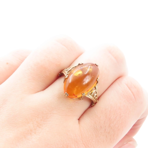 1256 - Basket Set Amber Statement Ring Mounted on 9 Carat Yellow Gold Ring Size R and a Half