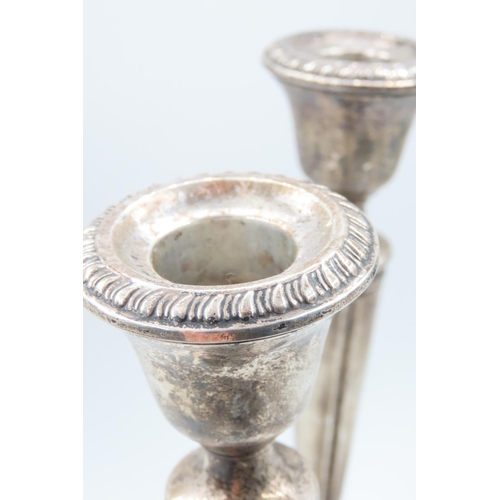 126 - Pair of Silver Pedestal Form Candle Rests Each Approximately 9 Inches High