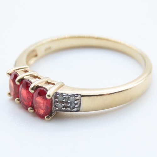 1356 - Three Stone Red Garnet and Diamond Set Ring Mounted in 9 Carat Yellow Gold Ring Size Q and a Half