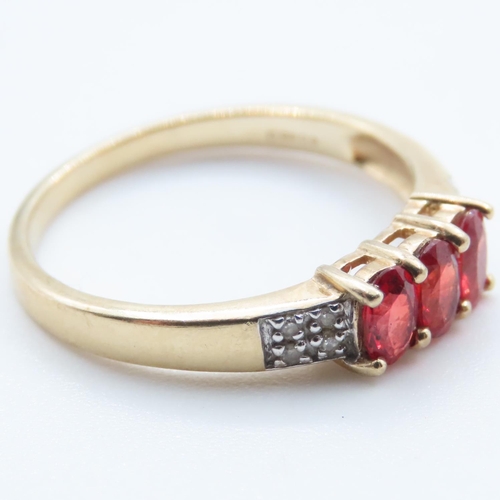 1356 - Three Stone Red Garnet and Diamond Set Ring Mounted in 9 Carat Yellow Gold Ring Size Q and a Half