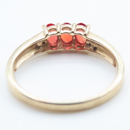 1356 - Three Stone Red Garnet and Diamond Set Ring Mounted in 9 Carat Yellow Gold Ring Size Q and a Half