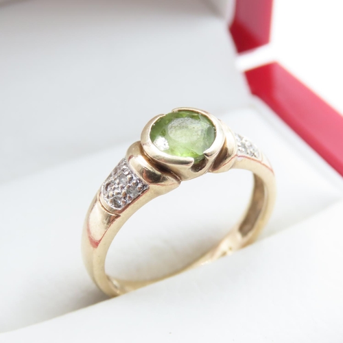 1361 - Half Bezel Set Peridot Ring Mounted in 9 Carat Yellow Gold with Further Diamonds Set to Shoulders Ri... 