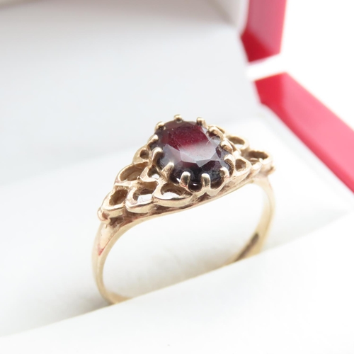 1367 - Red Garnet Ladies Ring Set in 9 Carat Yellow Gold Ring Size O