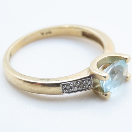 1372 - Aquamarine Solitaire Ring with Further Diamonds Set to Shoulder Mounted in 9 Carat Yellow Gold Ring ... 