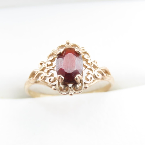 1374 - Red Garnet Ladies Ring Set in 9 Carat Yellow Gold Ring Size M