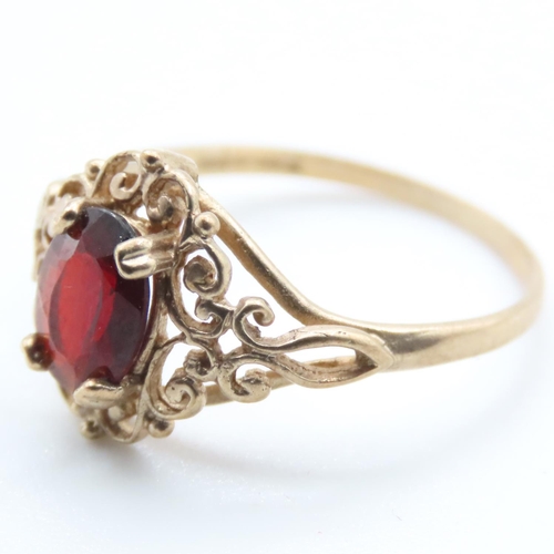 1374 - Red Garnet Ladies Ring Set in 9 Carat Yellow Gold Ring Size M