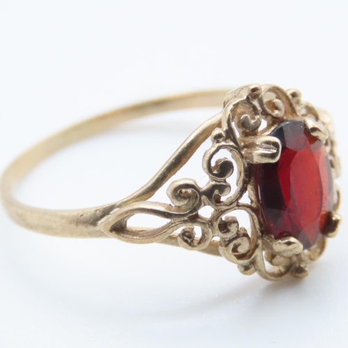 1374 - Red Garnet Ladies Ring Set in 9 Carat Yellow Gold Ring Size M