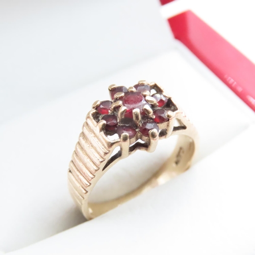 1598 - Red Garnet Cluster Ring Mounted in 9 Carat Yellow Gold Ring Size L