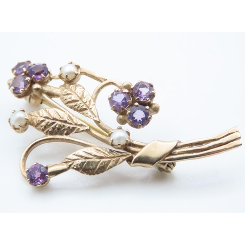 1600 - 9 Carat Yellow Gold Floral Brooch Set with Amethyst and Seed Pearls 5cm Wide