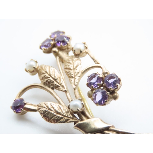 1600 - 9 Carat Yellow Gold Floral Brooch Set with Amethyst and Seed Pearls 5cm Wide