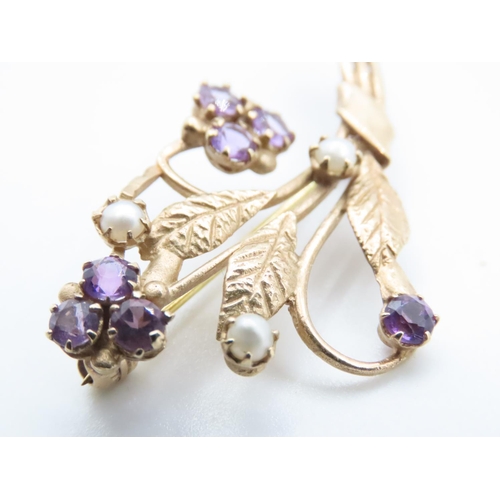 1600 - 9 Carat Yellow Gold Floral Brooch Set with Amethyst and Seed Pearls 5cm Wide