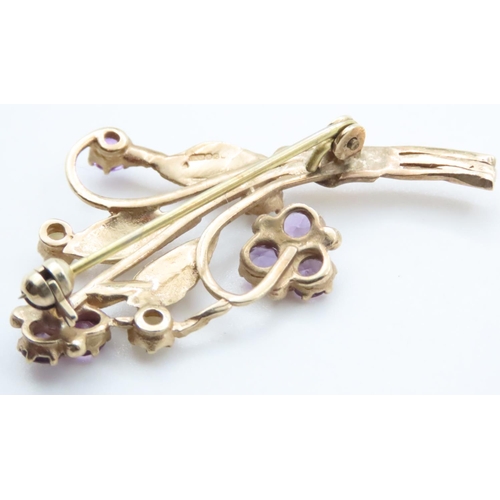 1600 - 9 Carat Yellow Gold Floral Brooch Set with Amethyst and Seed Pearls 5cm Wide