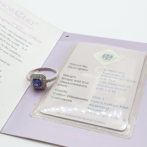 1613 - Cushion Cut Tanzanite Ring Mounted in Platinum with Further Diamond Halo Set Ring Size R