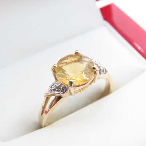 1630 - Citrine Set Ring with Further Diamond Inset to Shoulder Mounted on 9 Carat Yellow Gold Ring Size N