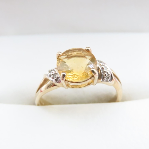 1630 - Citrine Set Ring with Further Diamond Inset to Shoulder Mounted on 9 Carat Yellow Gold Ring Size N