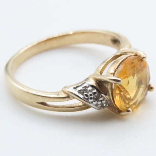 1630 - Citrine Set Ring with Further Diamond Inset to Shoulder Mounted on 9 Carat Yellow Gold Ring Size N