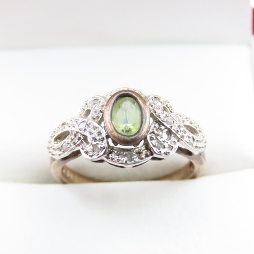 1632 - Bezel Set Peridot and Diamond Cluster Ring Mounted in 9 Carat Yellow Gold Ring Size M