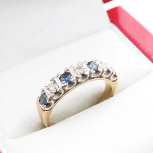 1642 - Seven Stone Diamond and Sapphire Half Eternity Ring Mounted in 9 Carat Yellow Gold Ring Size M