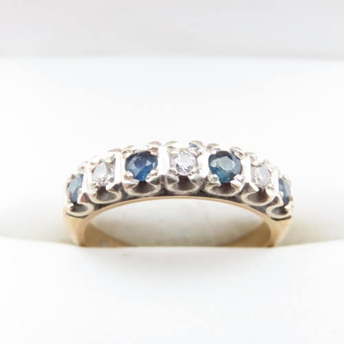 1642 - Seven Stone Diamond and Sapphire Half Eternity Ring Mounted in 9 Carat Yellow Gold Ring Size M