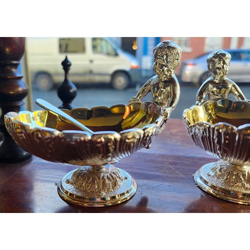 165 - Pair of Gilded and Silver Plated Boat Form Table Salts with Figural Decoration Spoons Present Each A... 