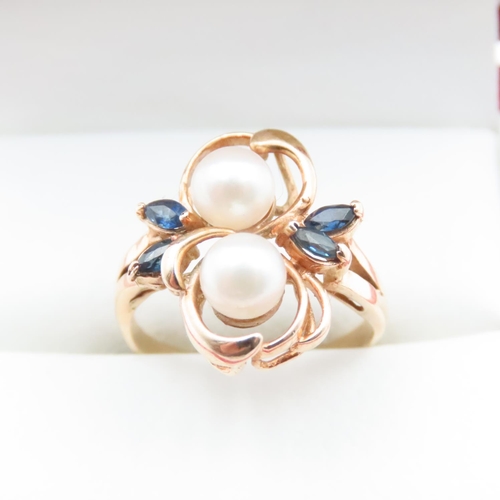 1651 - Unusual Floral Design Pearl and Sapphire Set Ring Mounted on 14 Carat Yellow Gold Band Ring Size M