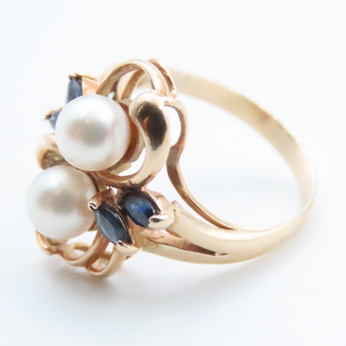 1651 - Unusual Floral Design Pearl and Sapphire Set Ring Mounted on 14 Carat Yellow Gold Band Ring Size M