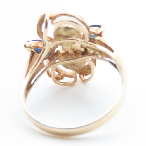 1651 - Unusual Floral Design Pearl and Sapphire Set Ring Mounted on 14 Carat Yellow Gold Band Ring Size M