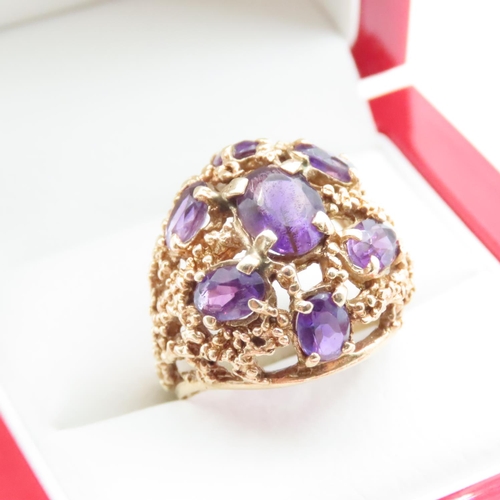 1653 - Amethyst Seven Stone Statement Ring Mounted in 14 Carat Yellow Gold Ring Size O and a Half