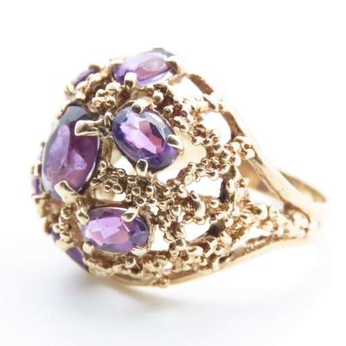 1653 - Amethyst Seven Stone Statement Ring Mounted in 14 Carat Yellow Gold Ring Size O and a Half