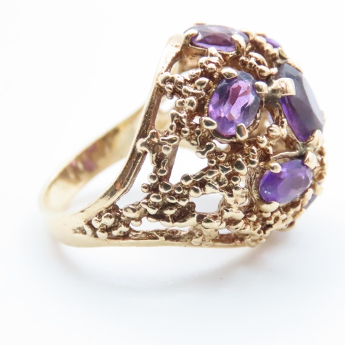 1653 - Amethyst Seven Stone Statement Ring Mounted in 14 Carat Yellow Gold Ring Size O and a Half