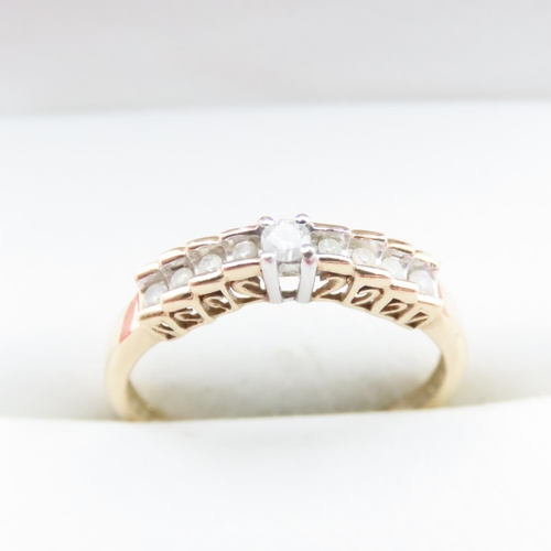 1656 - Nine Stone Bar Set Diamond Ring Mounted in 10 Carat Yellow Gold Ring Size N and a Half