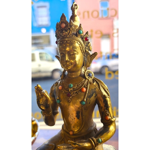 166 - Eastern Gilded Bronze Figure Seated Deity with Hand Raised Approximately 9 Inches High