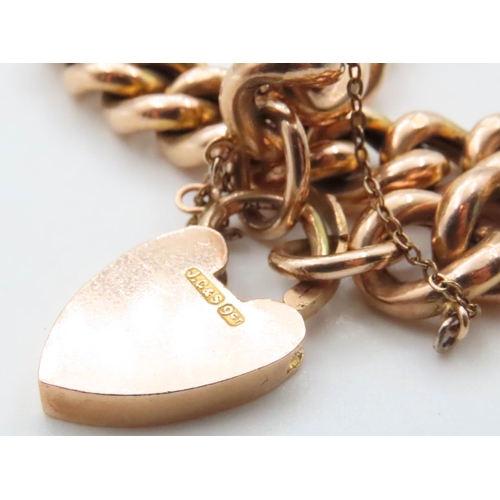 1662 - 9 Carat Yellow Gold Curb Link Heart Locket Bracelet 18cm Long