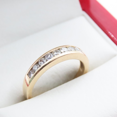 1673 - 14 Carat Yellow Gold Channel Set Diamond Half Eternity Ring Size N