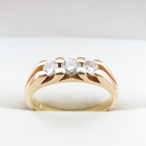 1676 - Diamond Three Stone Ring Mounted on 18 Carat Yellow Gold Band Ring Size N and a Half