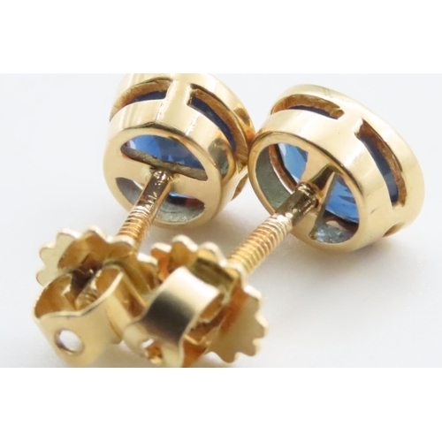 1693 - Sapphire Set 18 Carat Yellow Gold Stud Earrings Each Approximately 7mm High