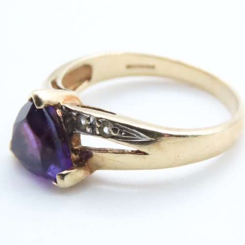 1698 - Amethyst and Diamond Ladies Ring Mounted on 9 Carat Yellow Gold Band Ring Size N and a Half