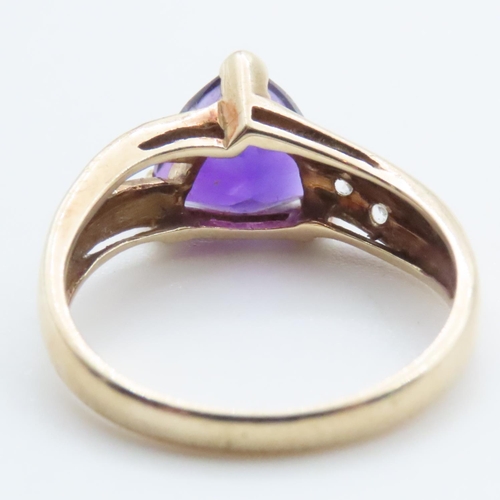 1698 - Amethyst and Diamond Ladies Ring Mounted on 9 Carat Yellow Gold Band Ring Size N and a Half