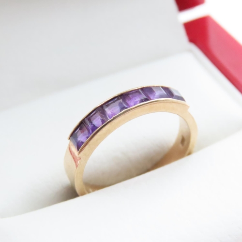 1704 - Six Stone Amethyst Ring Mounted in 9 Carat Yellow Gold Band Ring Size L