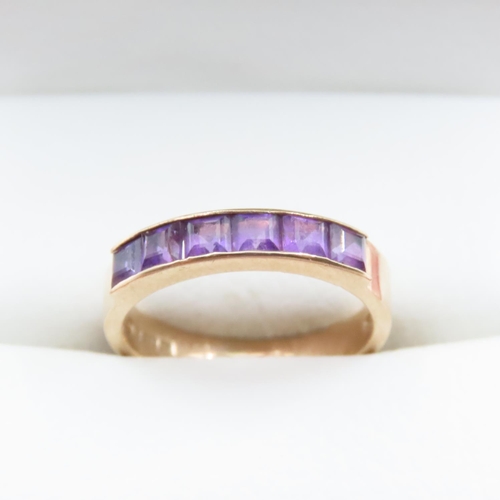 1704 - Six Stone Amethyst Ring Mounted in 9 Carat Yellow Gold Band Ring Size L