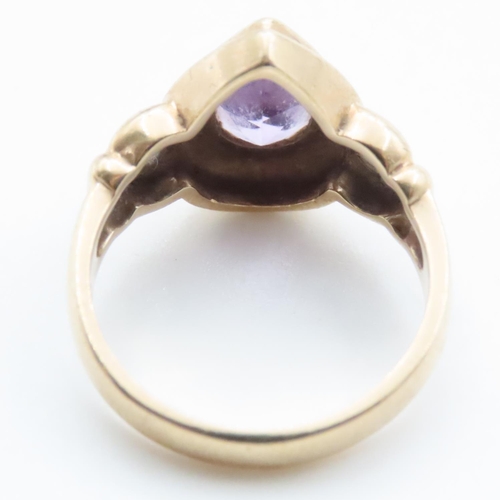 1705 - Pear Cut Bezel Set Amethyst Ring Mounted on 9 Carat Yellow Gold Band Ring Size L