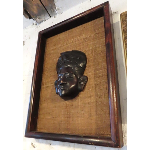 202 - Framed Eastern Carved Hardwood Tribal Mask Mounted on Linen Panel Approximately 22 Inches High x 14 ... 