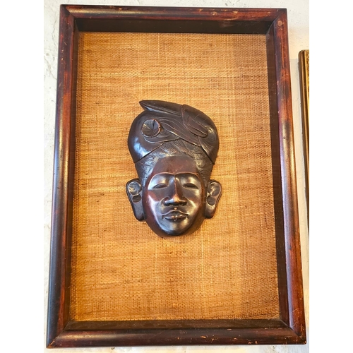 202 - Framed Eastern Carved Hardwood Tribal Mask Mounted on Linen Panel Approximately 22 Inches High x 14 ... 