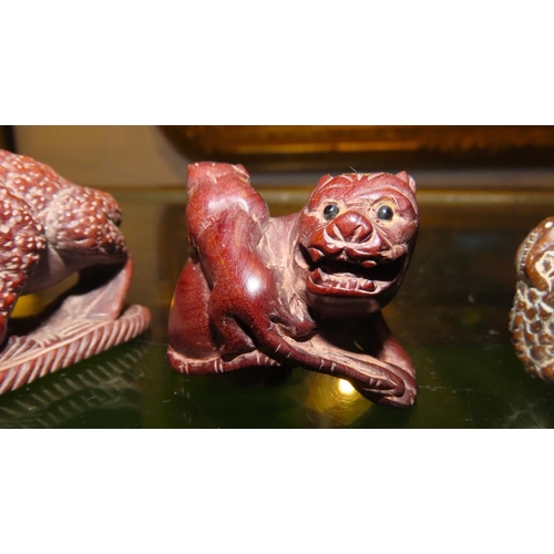 237 - Four Carved Netsuke Figures Including Foo Dog Largest Approximately 5cm High